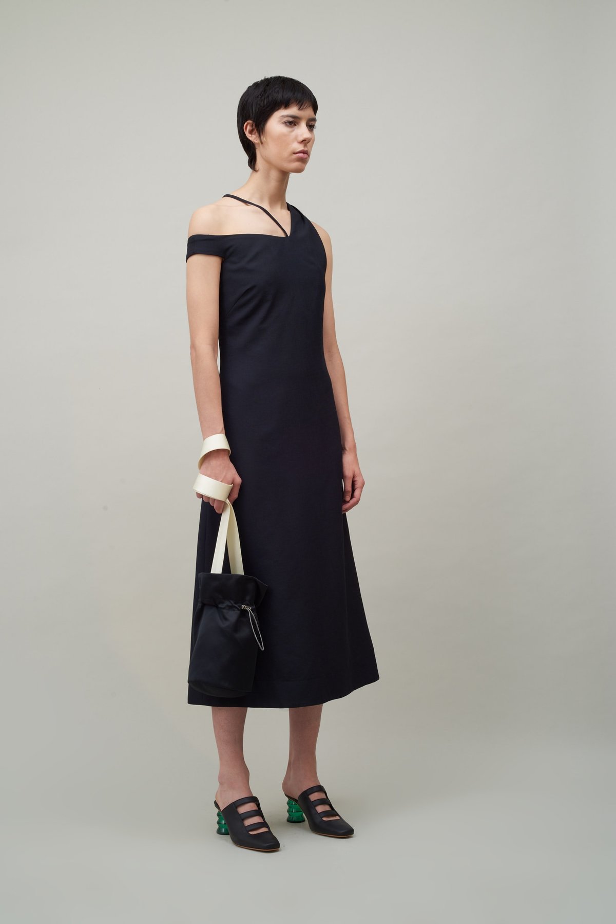 asymmetric off the shoulder sheath dress