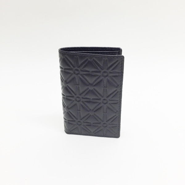 Comme des Garcons - Black Embossed Star Card Case Comme des Garcons - Black Embossed Star Card Case