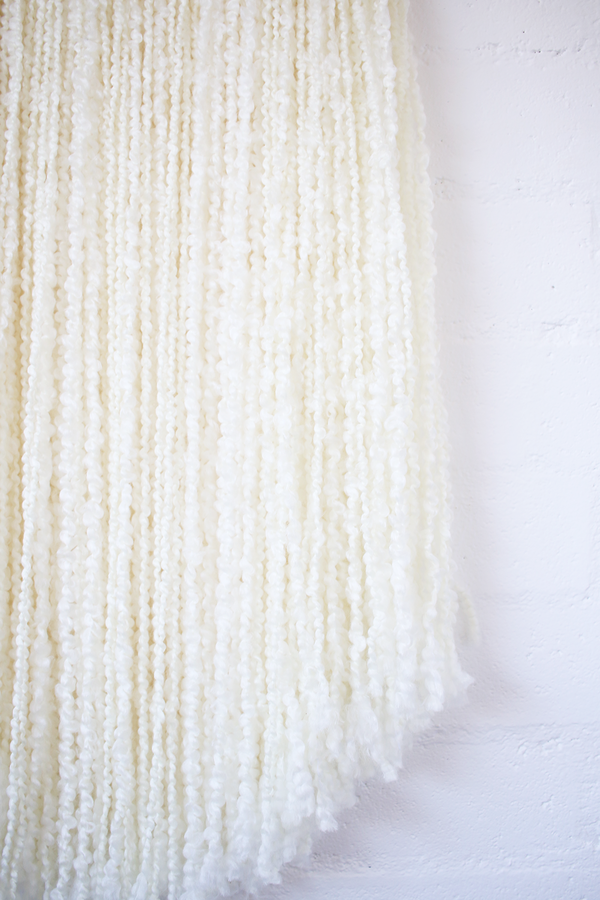 Sonadora White Fiber and Polished Brass Wall Hanging Sonadora White Fiber and Polished Brass Wall Hanging